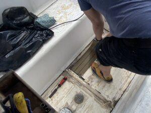 Chris removes the old flexiteak