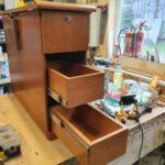 The cupboard was replaced with two drawers